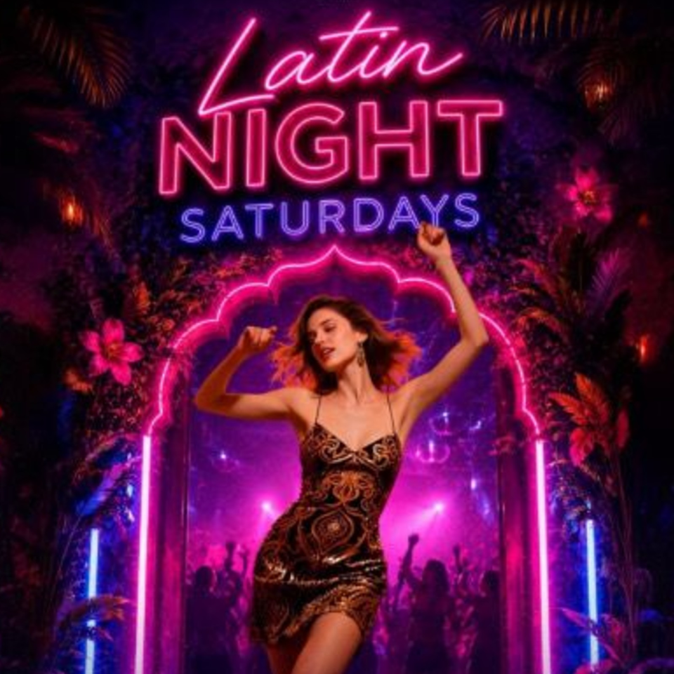 Woman dancing in a vibrant neon-lit nightclub beneath text reading “Latin Night Saturdays.”